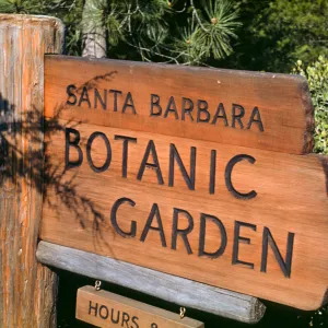old wood sign at driveway entrance on Mission Canyon Road, Santa Barbara Botanic Garden Sign