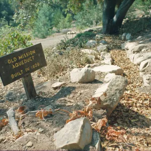 'Old Mission Aqueduct, built in 1806' wood sign