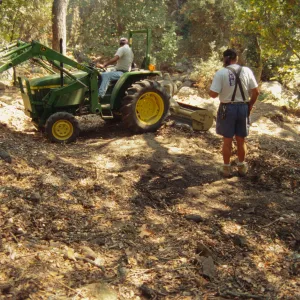 tractor, working on the old Mission Aqueduct