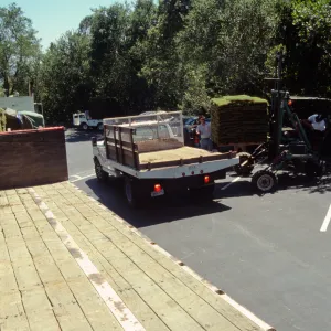 tractor unloading sod for the new Meadow lawn