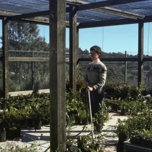 Caroline Cooper watering at the Horticulture Unit