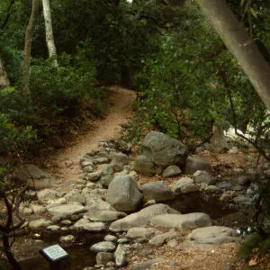 Path leading up to and leaving Mission Creek crossing with sign