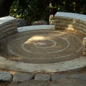 Close up of Spiral bench in Fiber Arts Display with signage