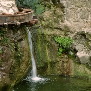 Waterfall and wooden aqueduct under Mission Dam