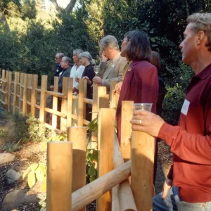 garden employees and guests at tea house event