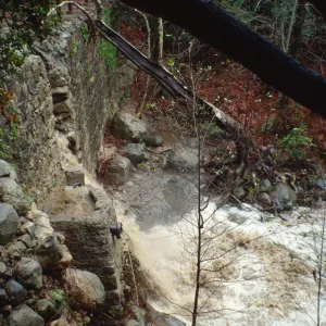 Mission Creek flooding through Mission Dam