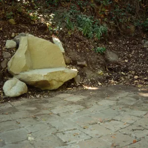 new stone bench on west side of Mission Dam, exposed tiles