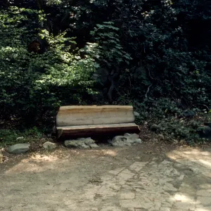 wood bench on east side of Mission Dam