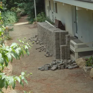 pavers stacked for installation in the Arroyo, along the bottom level of the North Wing