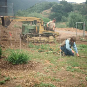 Excavations for raised bed, David Lansing kneeling