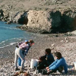 West San Benito Island, Debbie Bronson w/fishermen at village