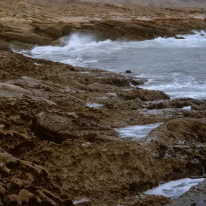 12/ looking East, rocky coast, 1.5 miles Northwest of Dutch Harbor, 65-160 & SN-77
