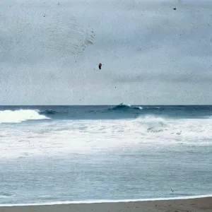 waves breaking on sandspit, 66-81 & SN-337
